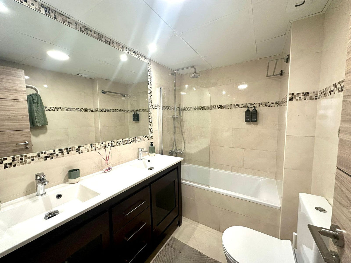 Apartamento reformado con terraza de 70 m²