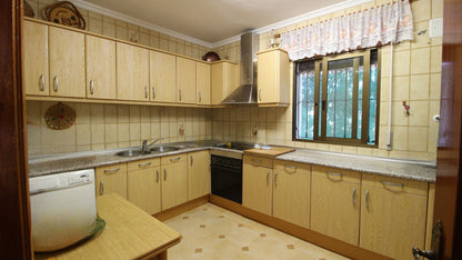 Apartamento en planta baja de una villa
